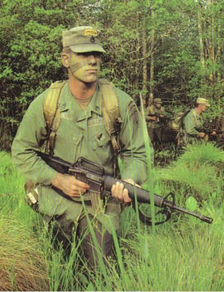Ranger patrolling through dense brush